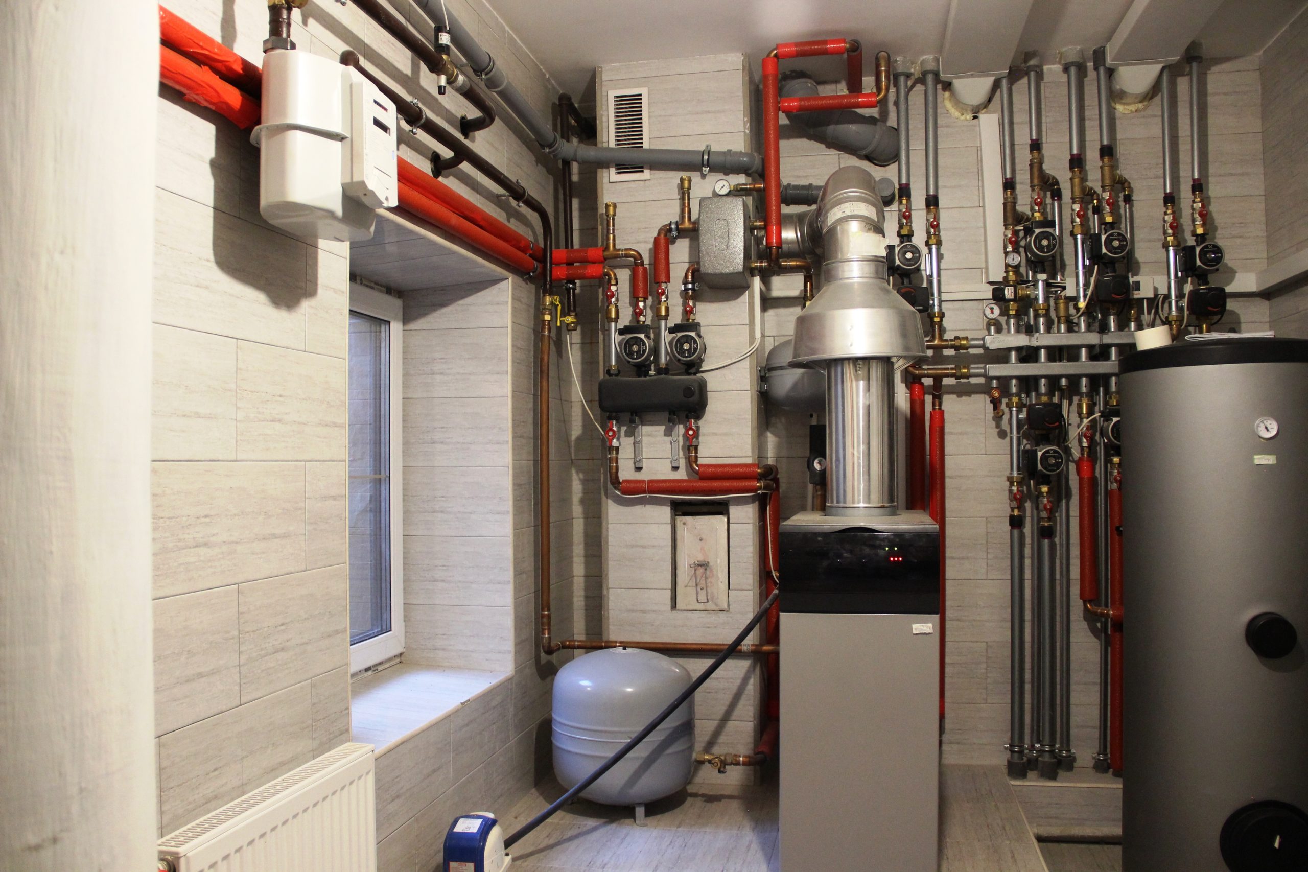 Autonomous heating system in the boiler room. boiler, water heater, expansion tank and other pipes